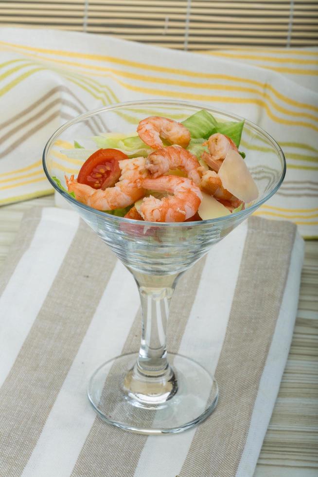 Caesar salad with shrimps photo