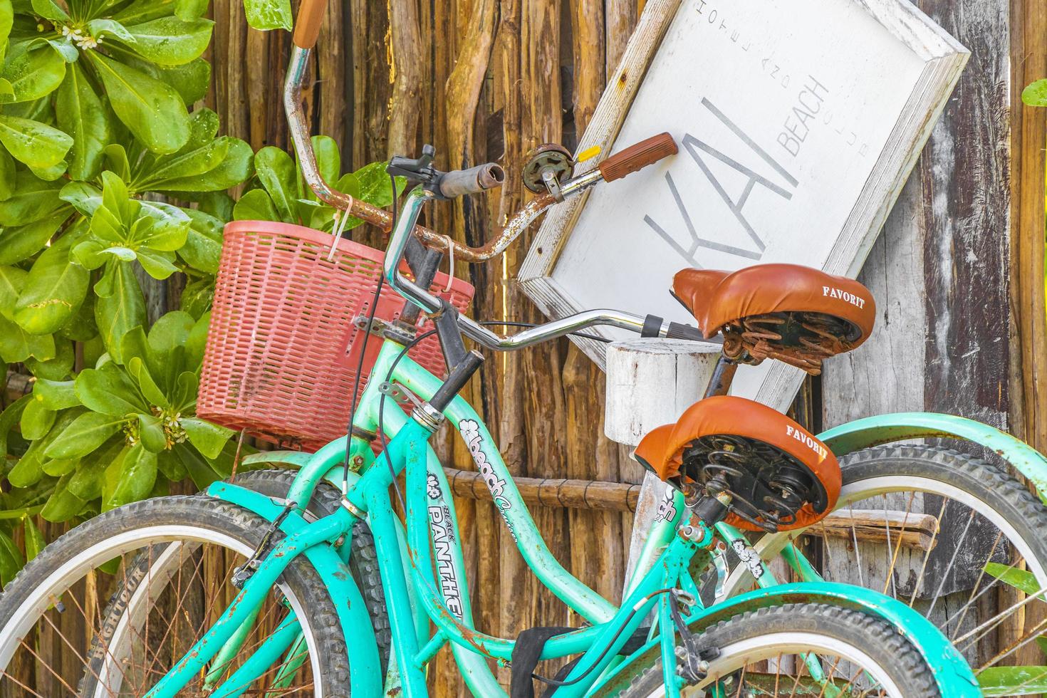 Tulum Quintana Roo Mexico 2022 Turquoise bikes bicycles at caribbean coast and beach Tulum Mexico. photo