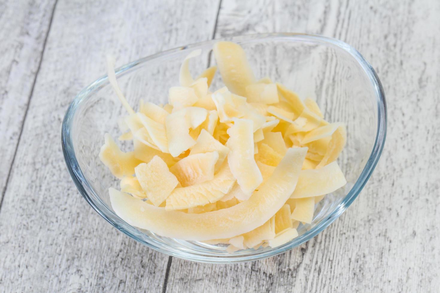 Coconut dry chips in the bowl photo