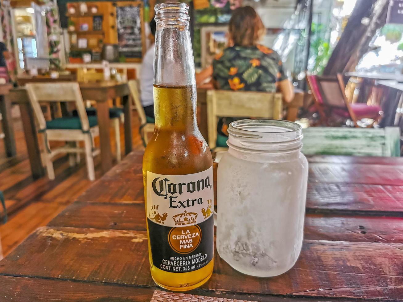 Playa del Carmen Quintana Roo Mexico 2022 Corona beer bottle in restaurant PapaCharly Playa del Carmen Mexico. photo