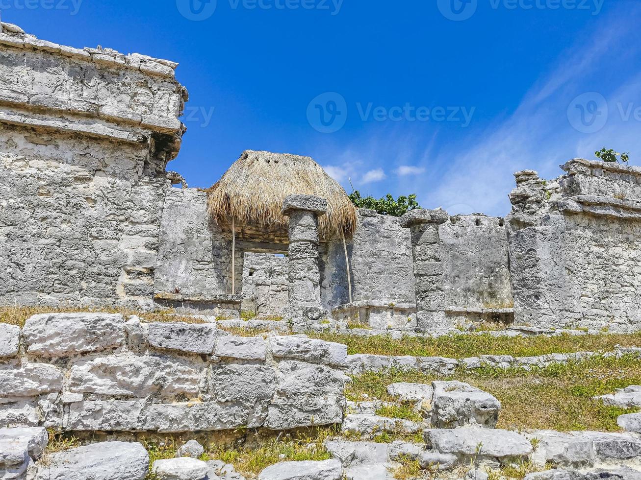 Ancient Tulum ruins Mayan site temple pyramids artifacts seascape Mexico. photo