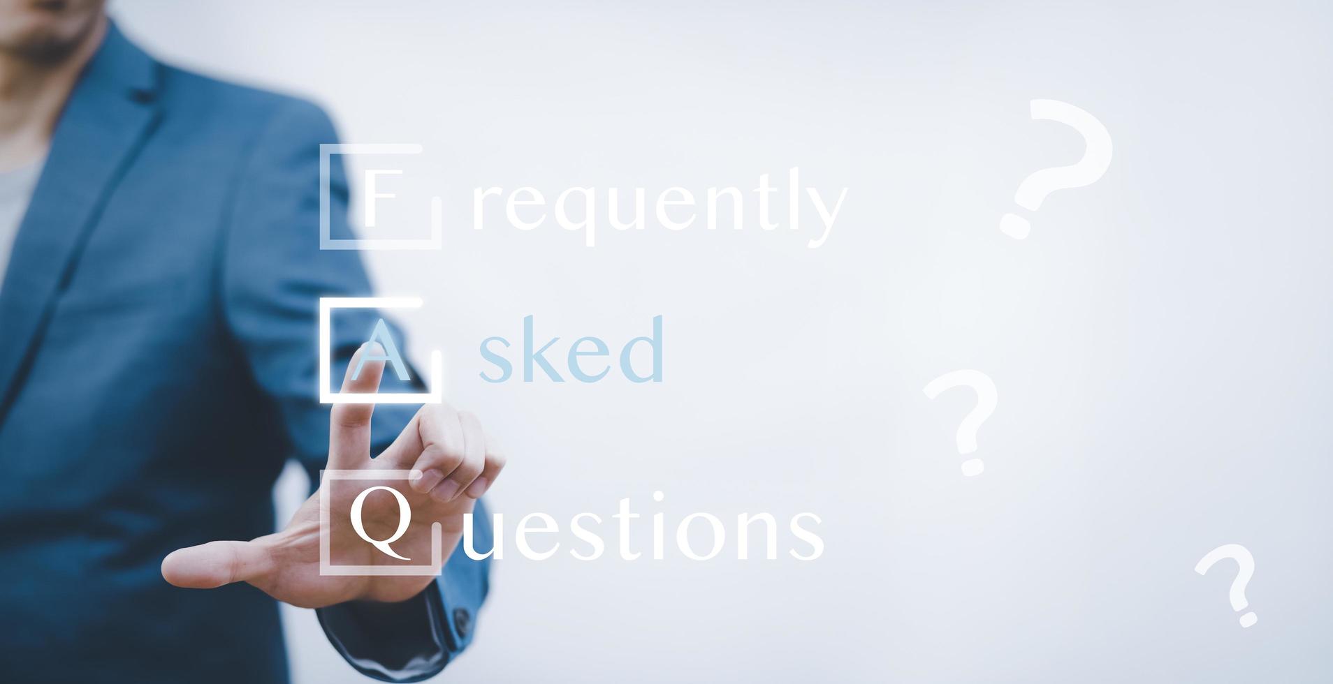 Businessman clicking FAQ or Frequently asked questions button on search toolbar, FAQ sign connection icon web communication, concept for website service. photo