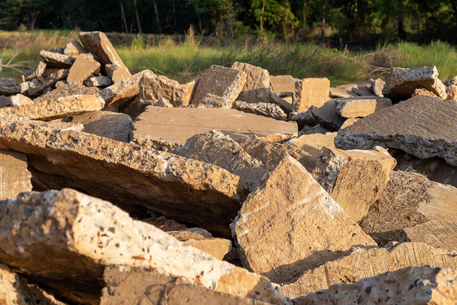 Large concrete debris with sunlight. photo