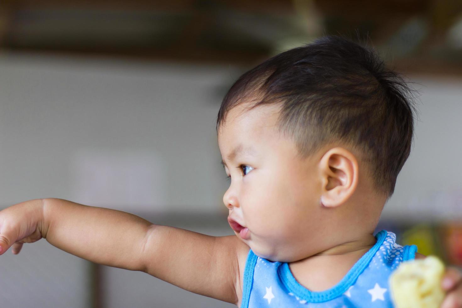 Face of boy pointing photo