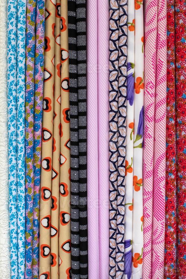 Colorful fabric background, different patterns. photo
