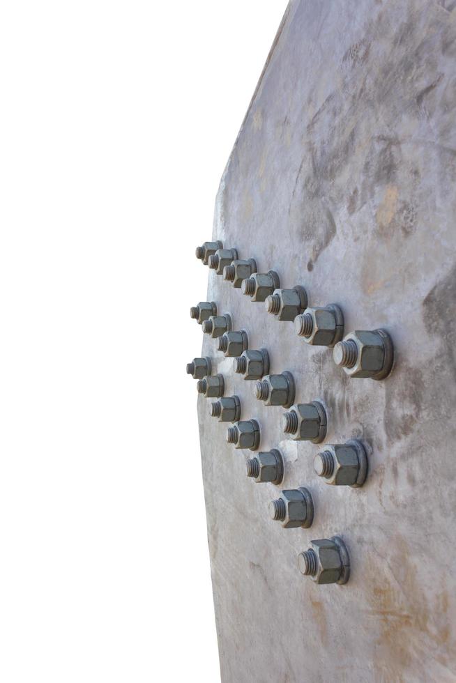 Many bolts on a large metal platform. photo