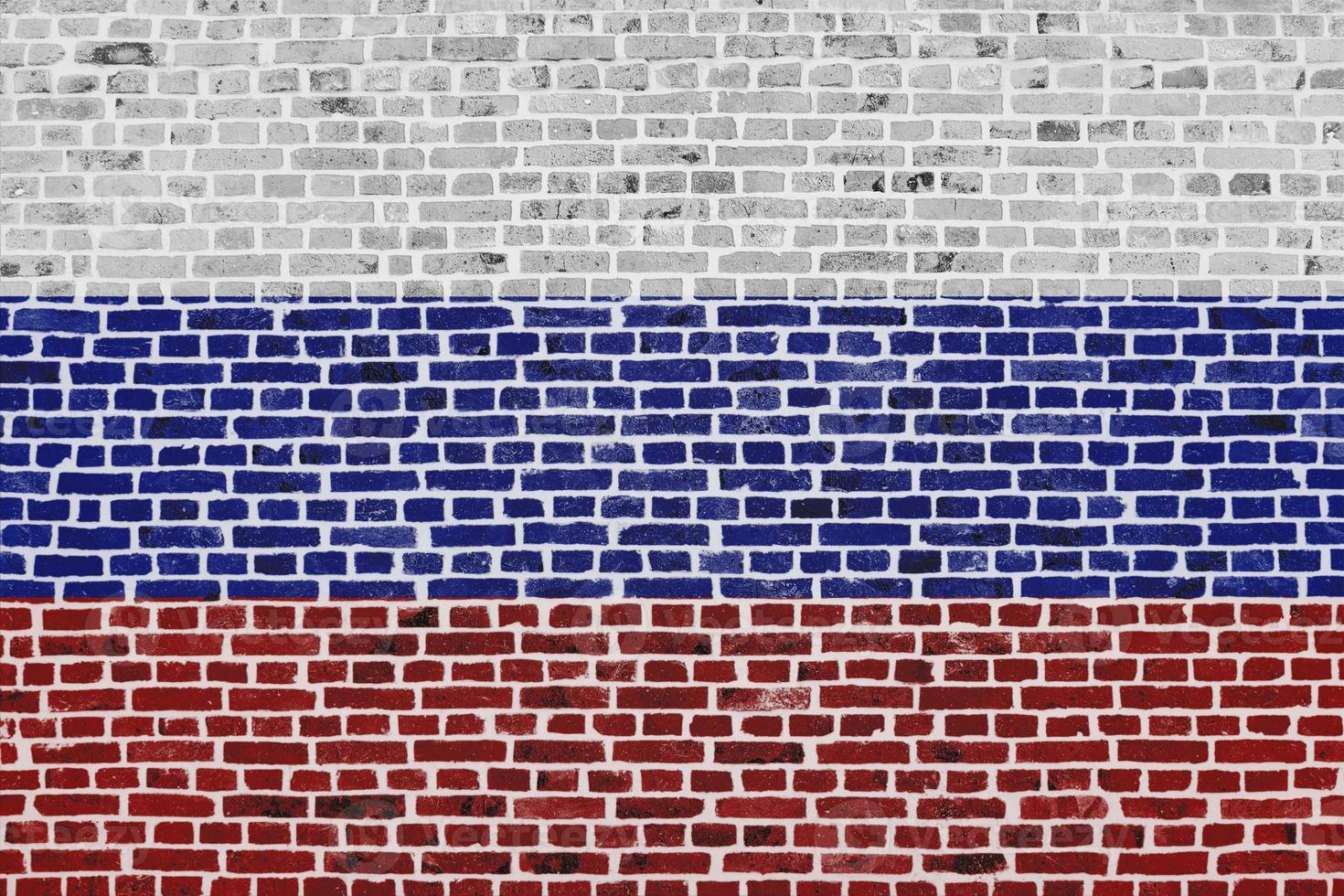 Flag of Russia painted on a brick wall photo