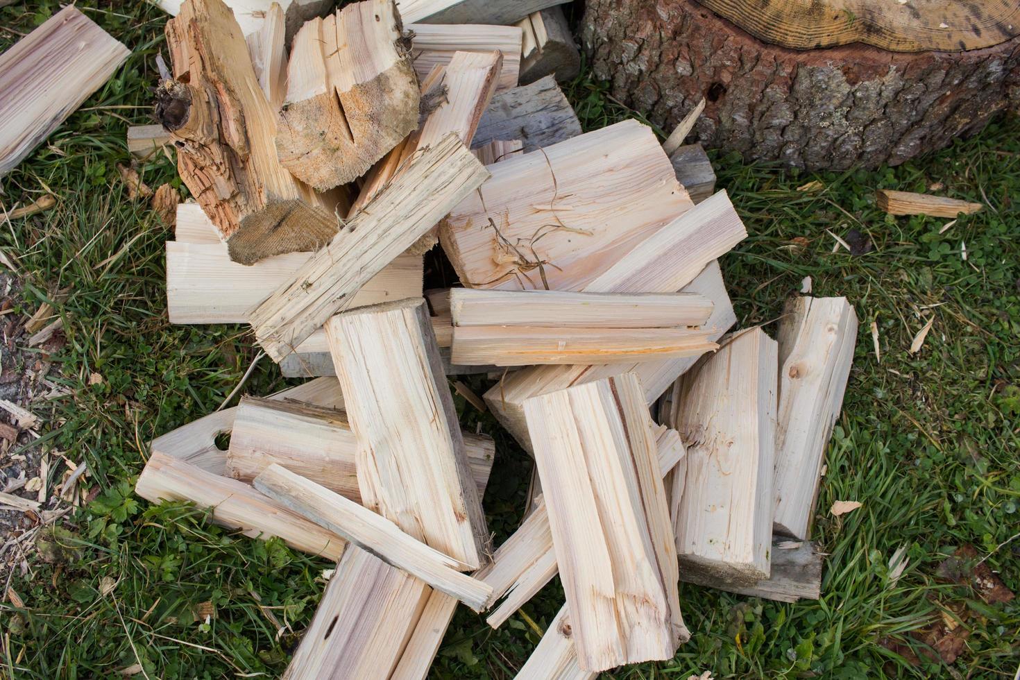 Close up piture of chopping firewood, country photo with wood and axe