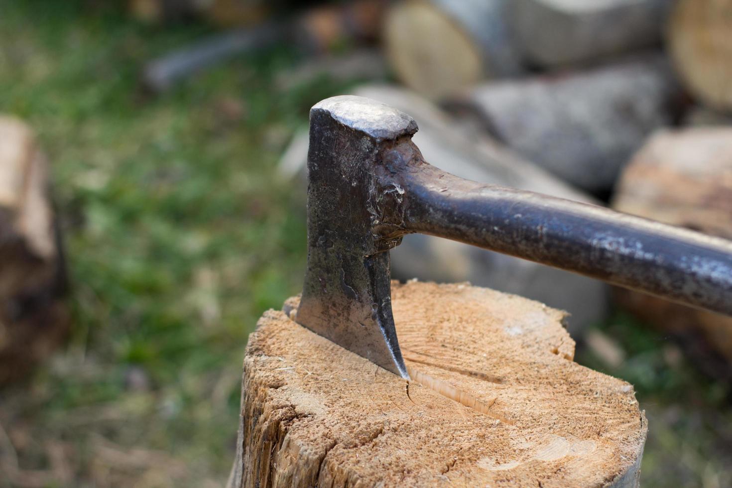 Close up piture of chopping firewood, country photo with wood and axe