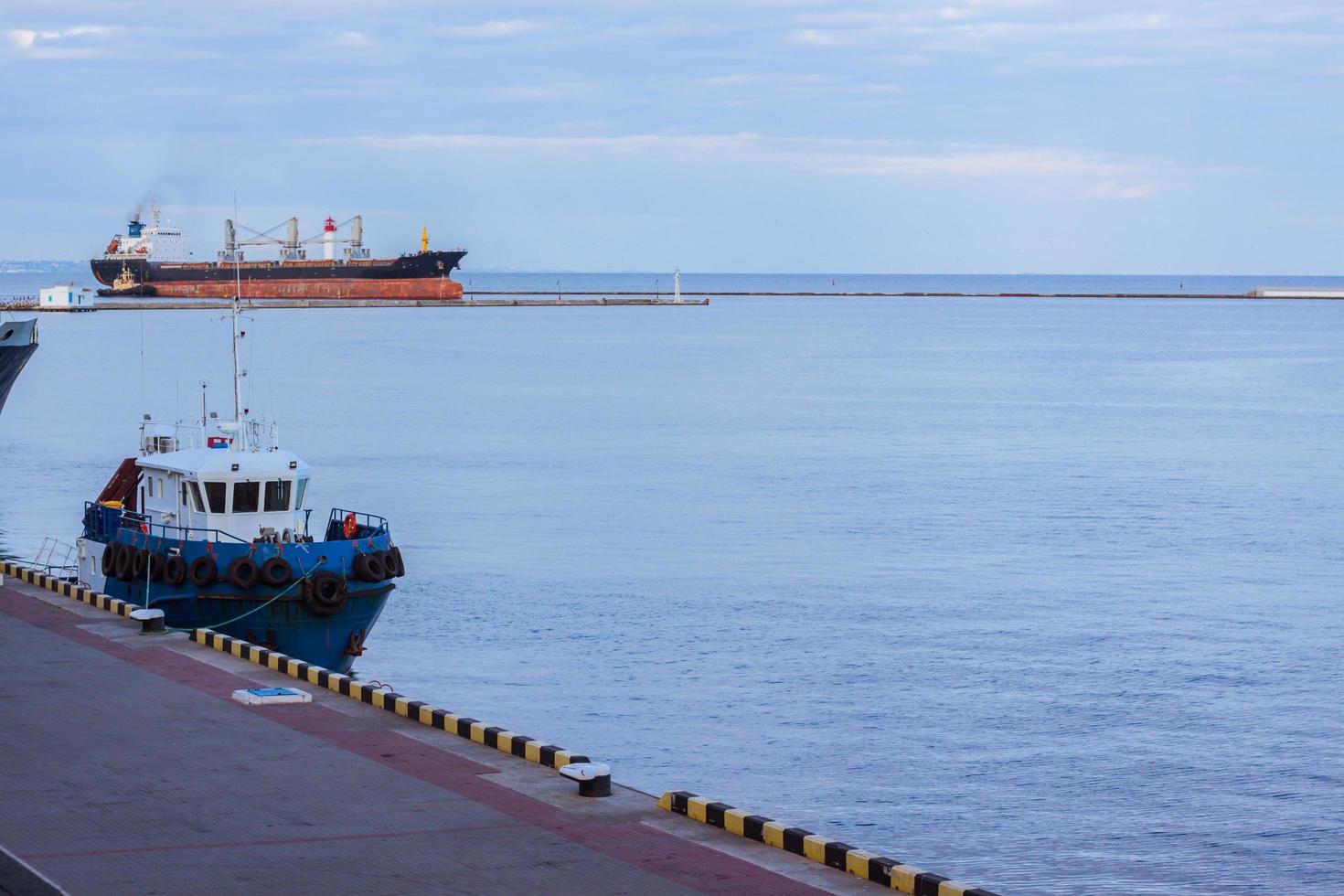 sea port landscape with tow boat photo