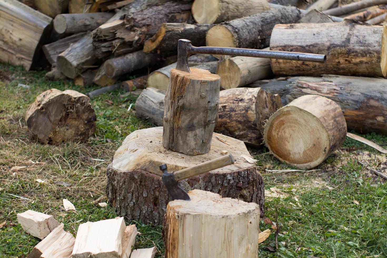Close up piture of chopping firewood, country photo with wood and axe