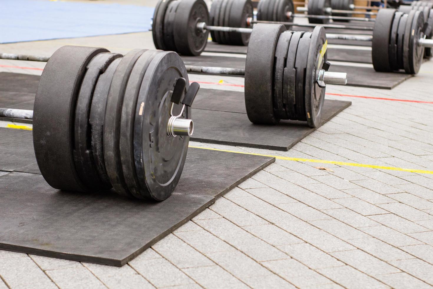 weight lifting equipment, outdoors powerlifting competition, closeups