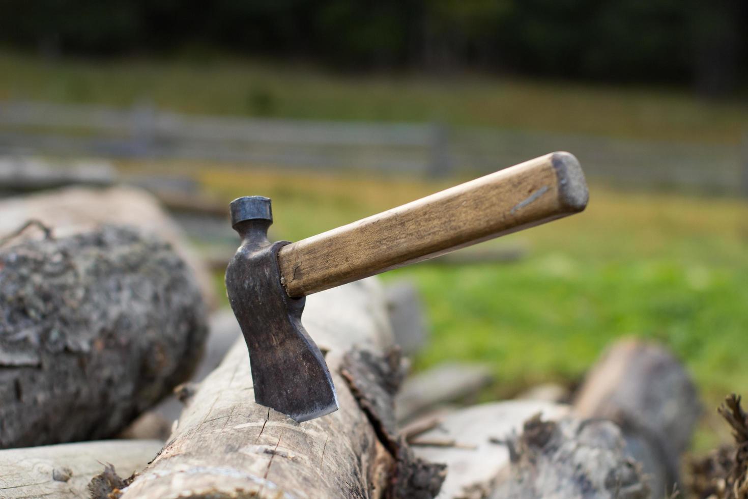 Close up piture of chopping firewood, country photo with wood and axe