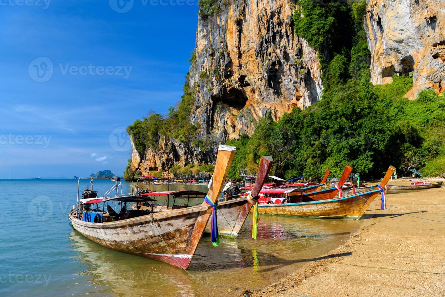 Long tail boat on tropical beach, Tonsai Bay, Railay Beach, Ao N photo