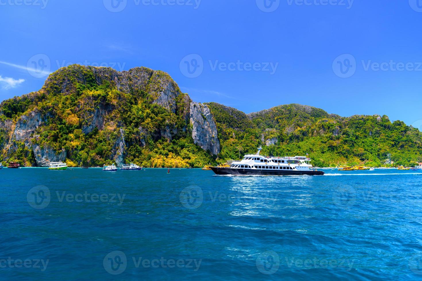 Ferries and rocks, Phi Phi Don island, Andaman sea, Krabi, Thail photo