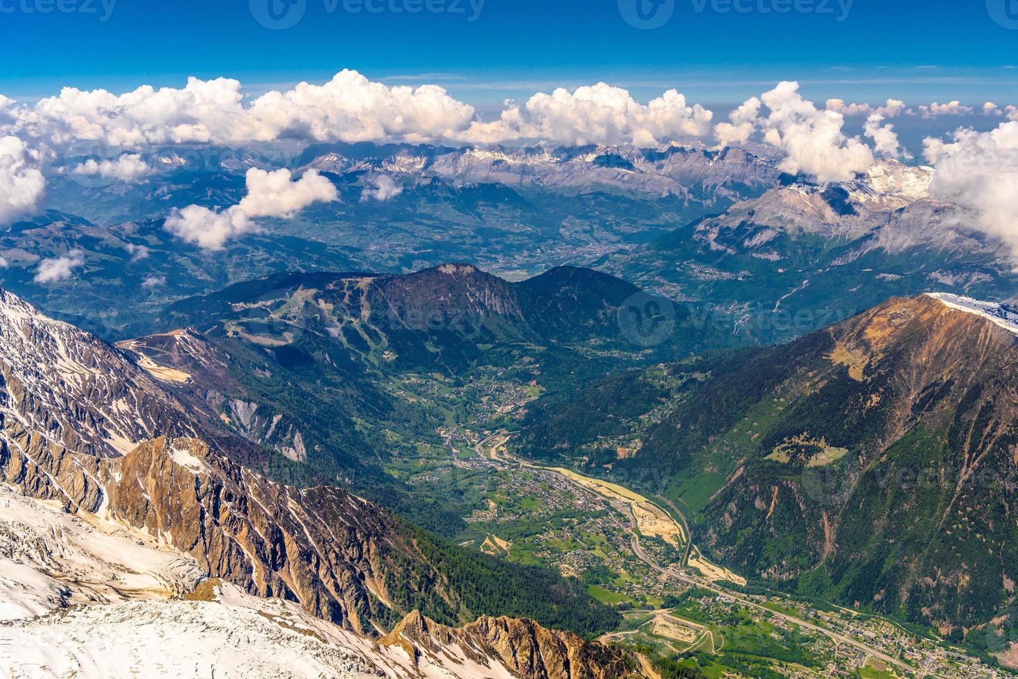 Valley with villages between snowy mountains Chamonix, Mont Blanc, Haute-Savoie, Alps, France photo