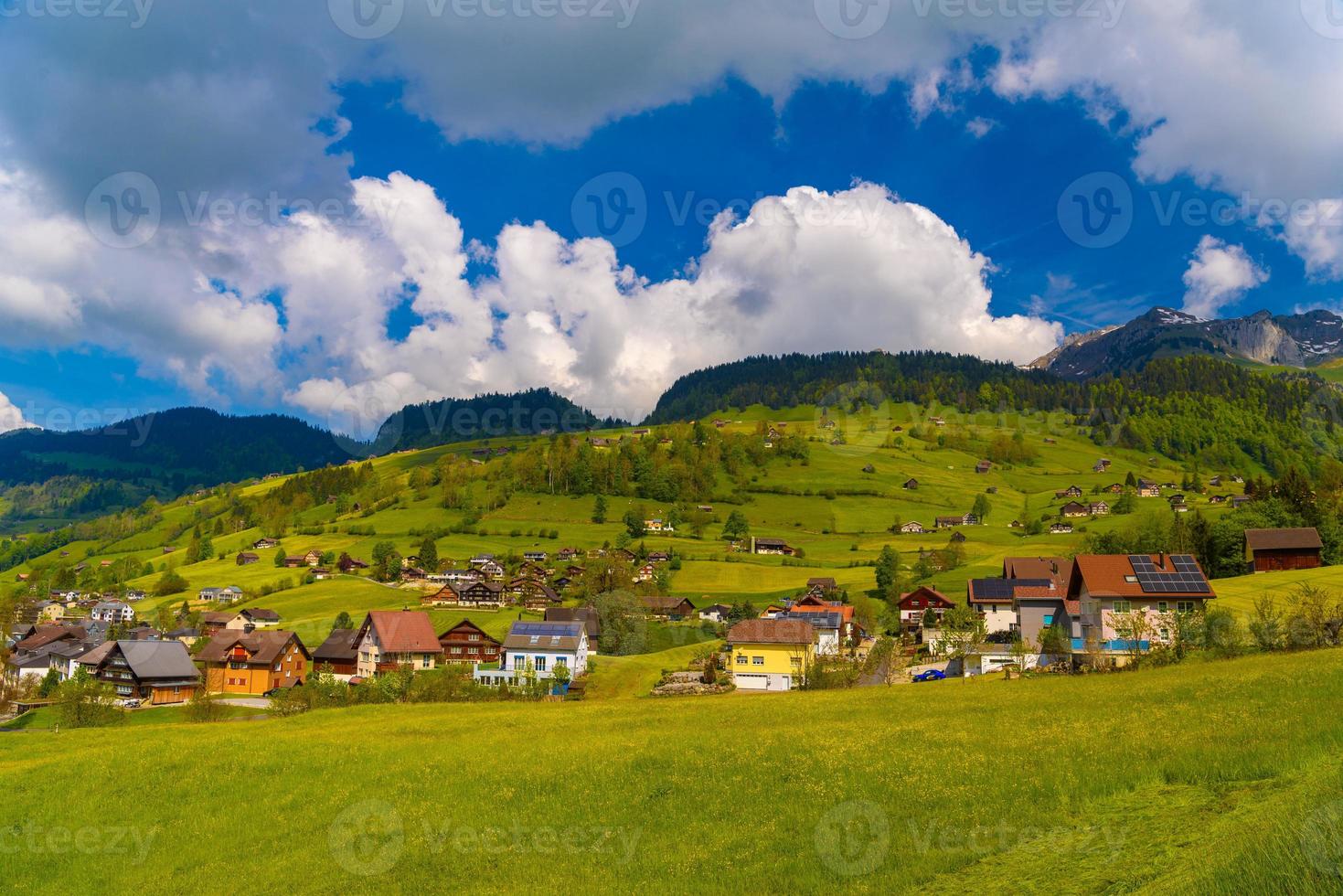 Wooden cottage houses in mountain village, Alt Sankt Johann, San photo