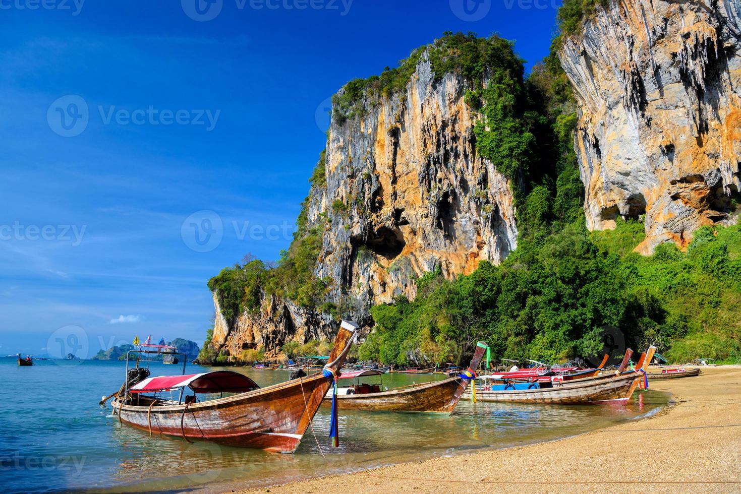 Long tail boats on tropical beach, Tonsai Bay, Railay Beach, Ao photo