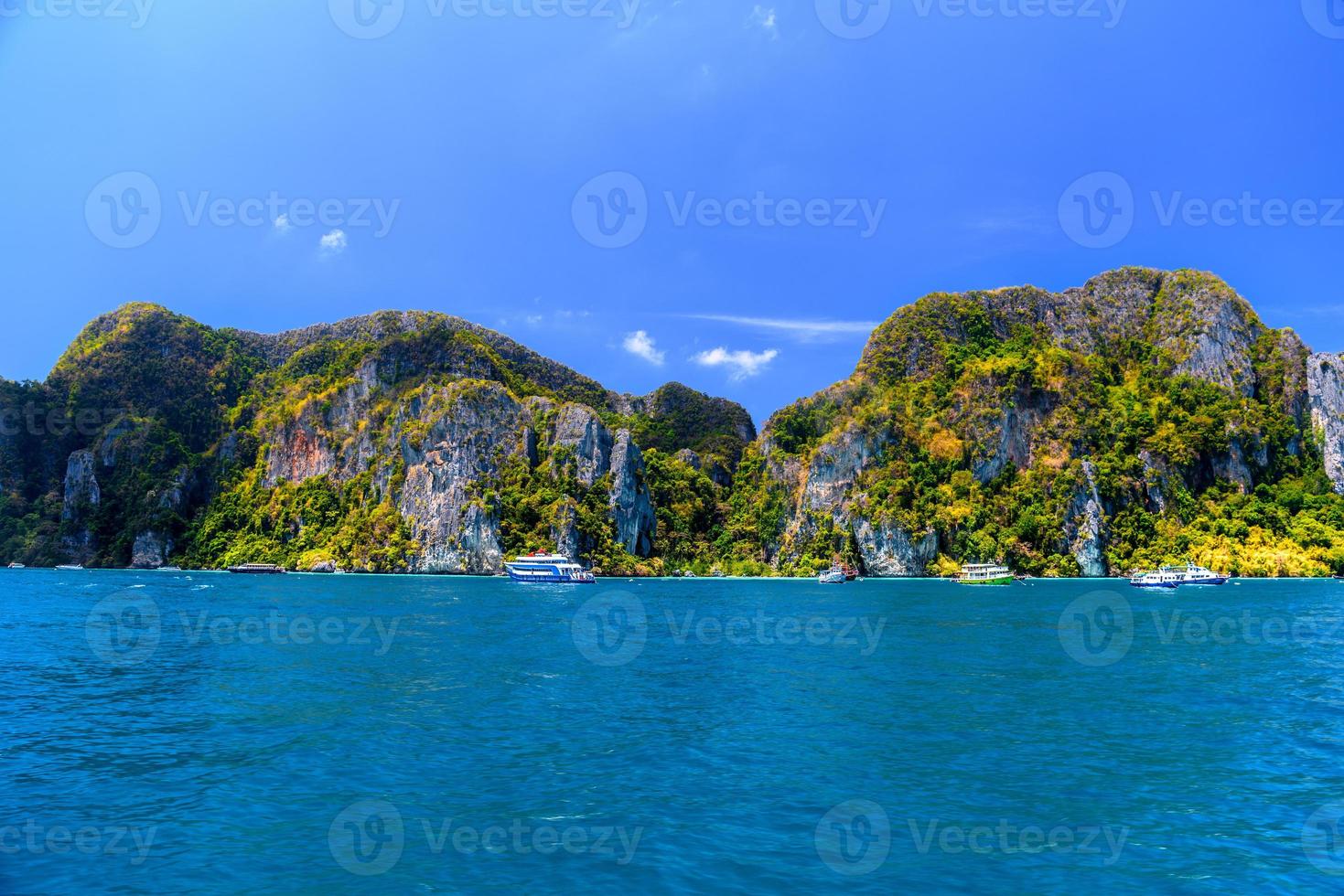 Ferries and rocks, Phi Phi Don island, Andaman sea, Krabi, Thail photo