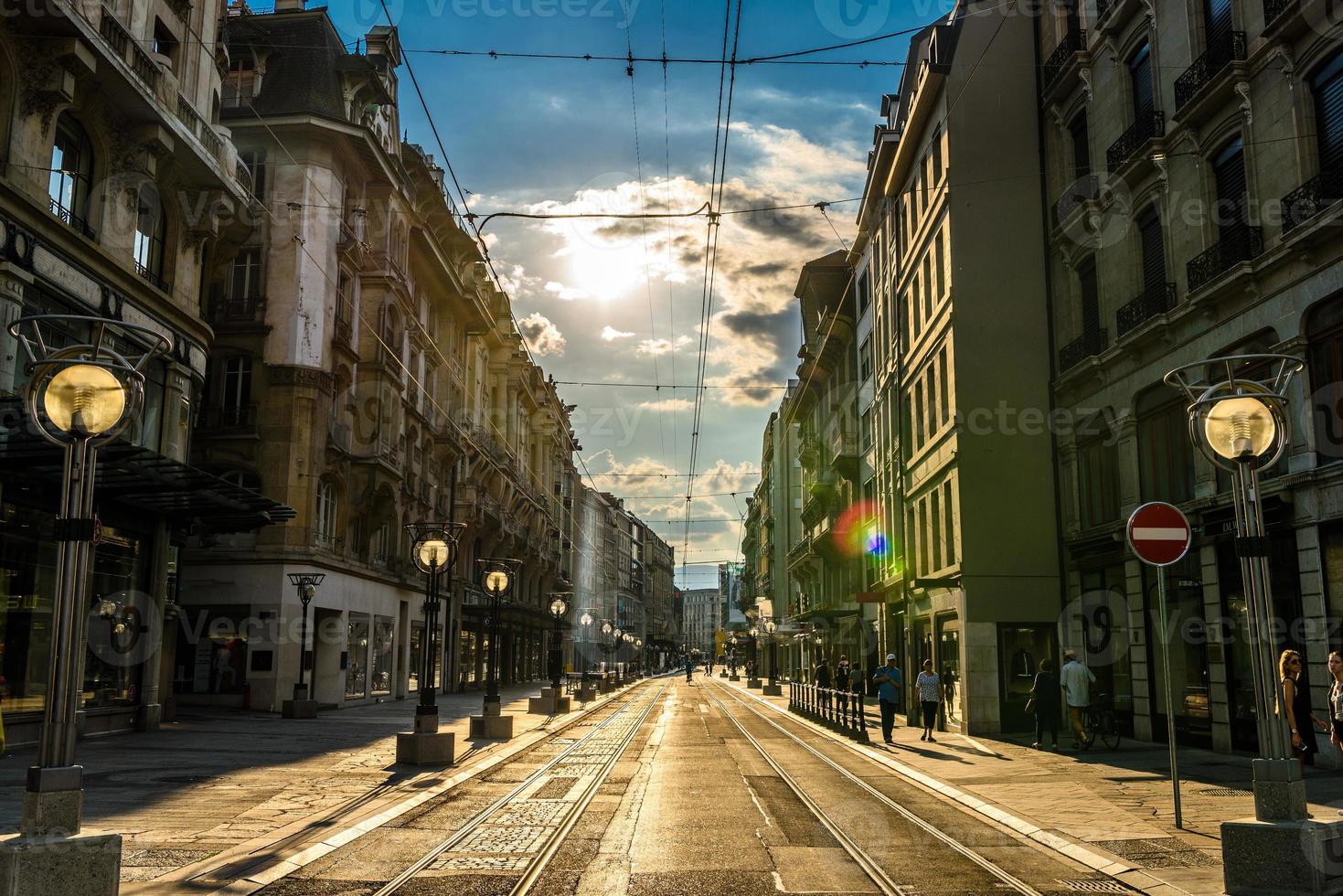 Tram railway in sunset in Geneva, Switzerland photo