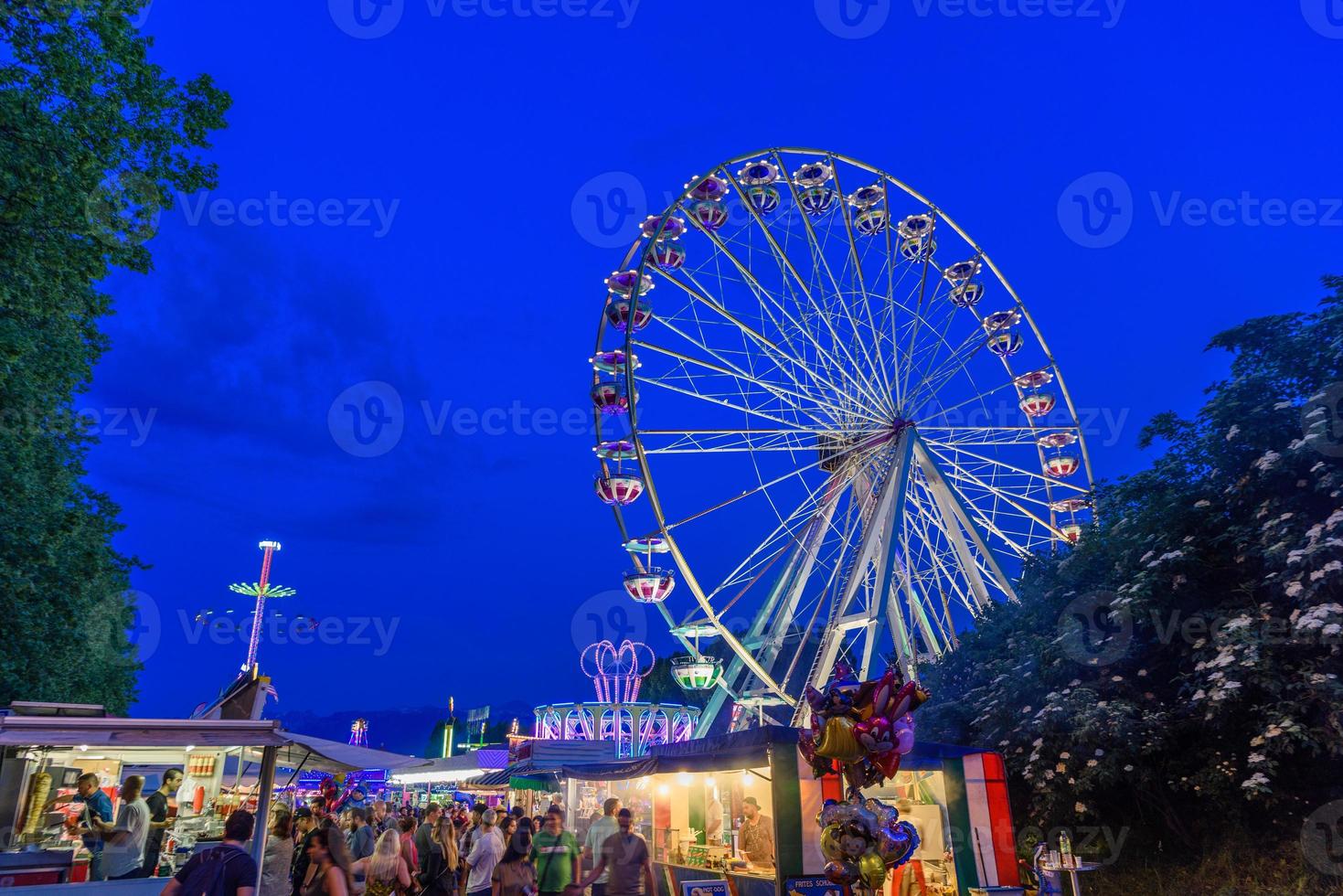 Ferris wheel in amusement park in Lausanne, Switzerland photo
