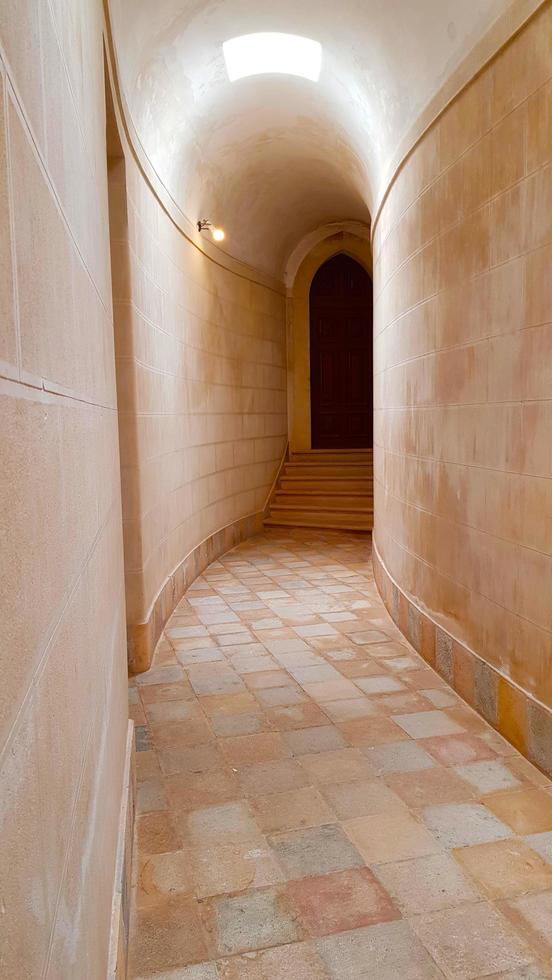 Vaulted hallway inside the building photo