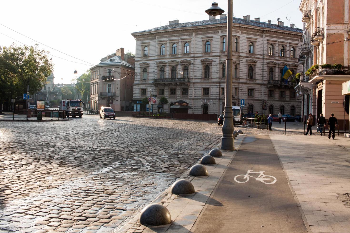 picture of empty bicucle road in old europ city photo