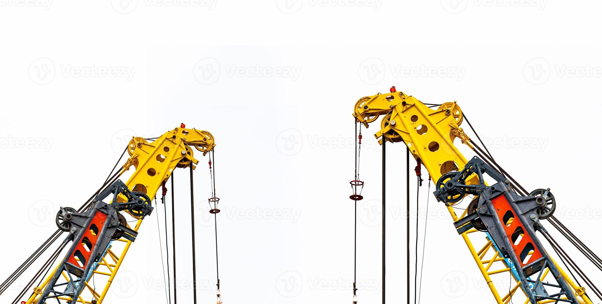 Big yellow construction crane for heavy lifting isolated on white background. Construction industry. crane for container lift or at construction site. Crane rental business concept. Crane dealership. photo