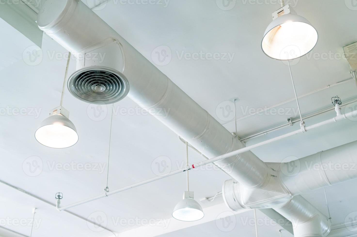 Air duct, automatic fire sprinkler safety system. Fire protection and detector. Fire sprinkler system. Building interior concept. Ceiling lamp light with opened light. Interior architecture concept. photo