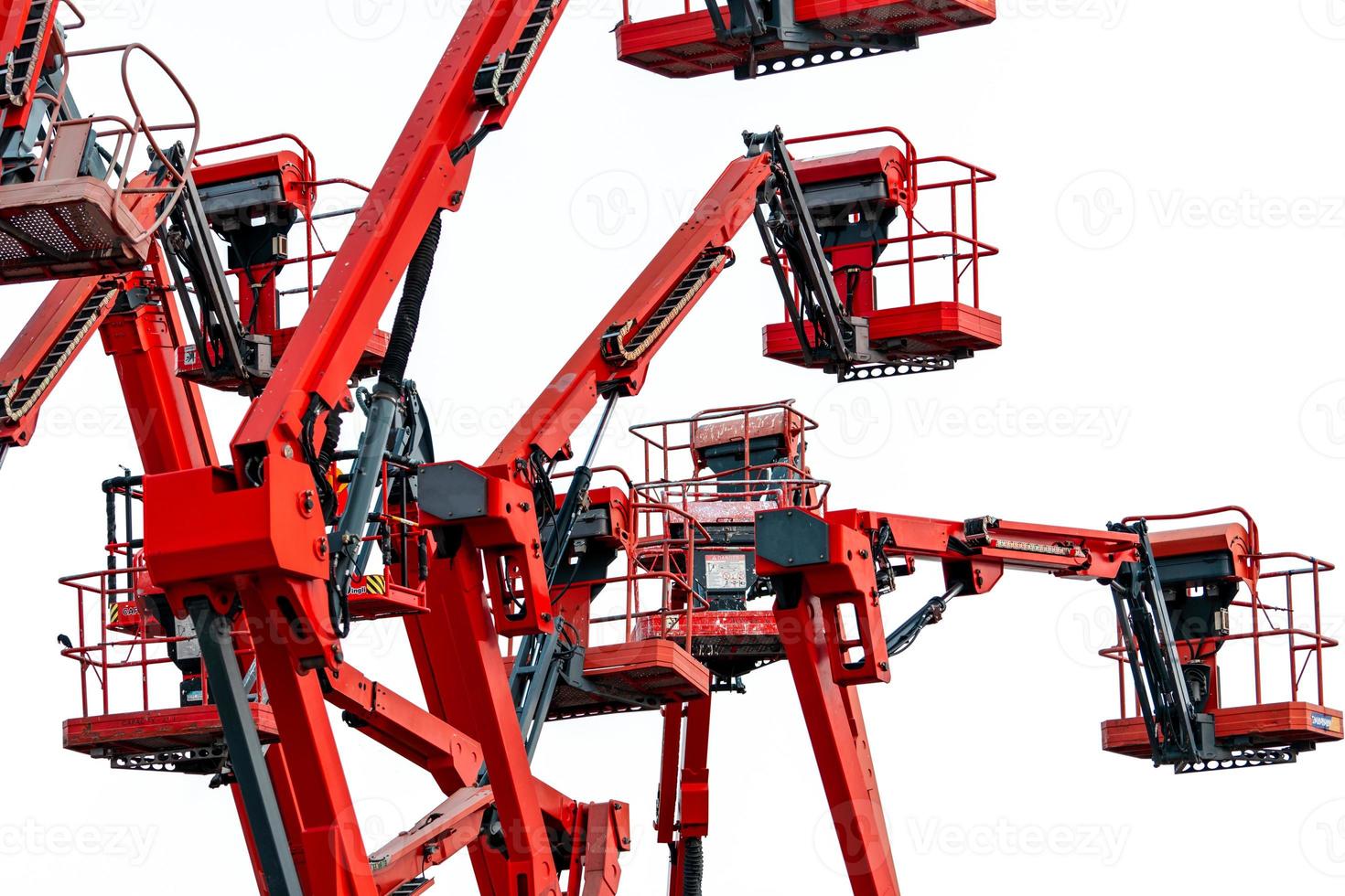 Articulated boom lift. Aerial platform lift. Telescopic boom lift isolated on white background. Mobile construction crane for rent and sale. Maintenance and repair boom lift service. Crane dealership. photo