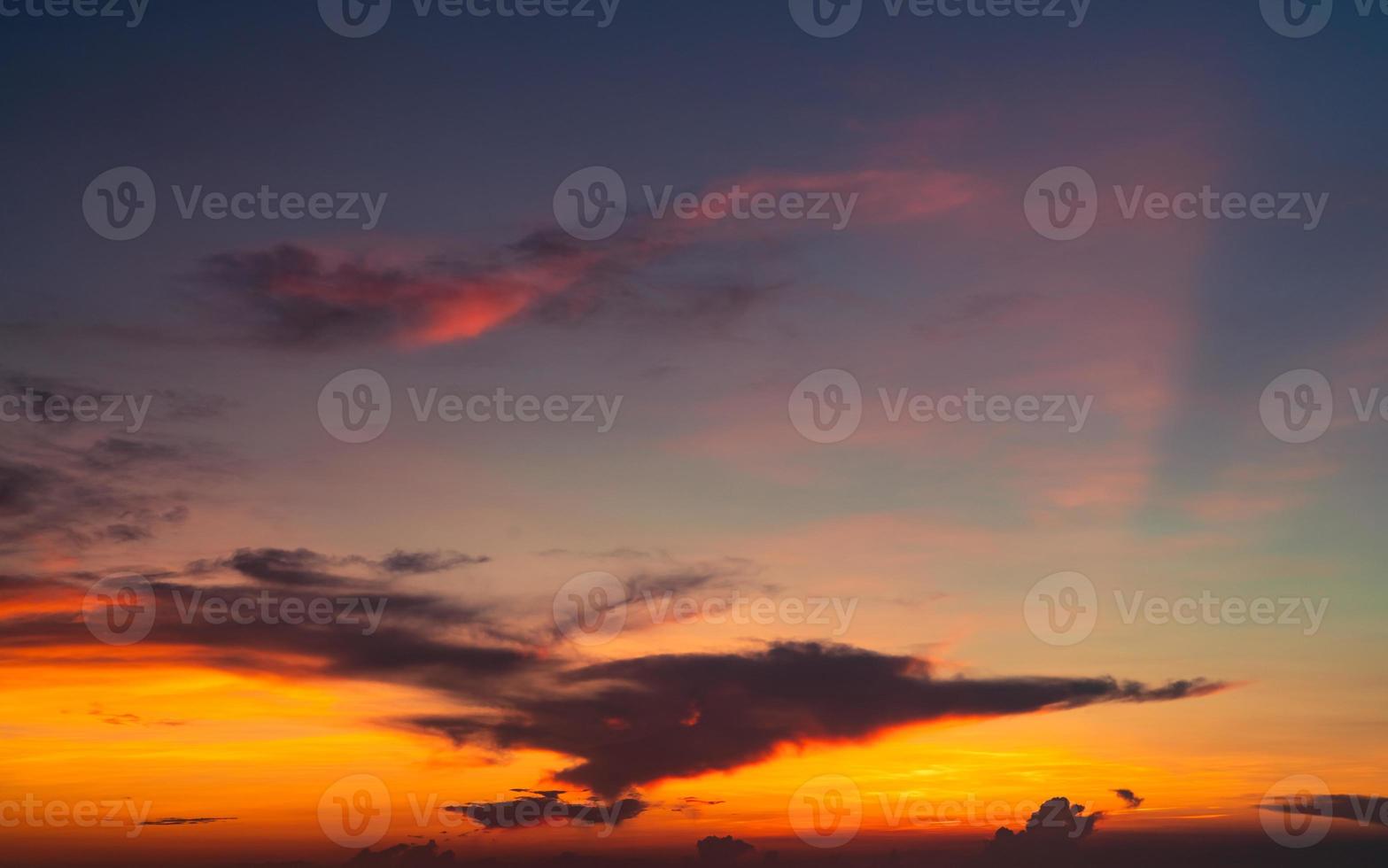 Dramatic red and orange sky and clouds texture background. Dark and orange clouds on sunset sky. The sky at dusk. Sunset abstract background. Dusk and dawn. Freedom concept. Heaven sky. Tranquility. photo