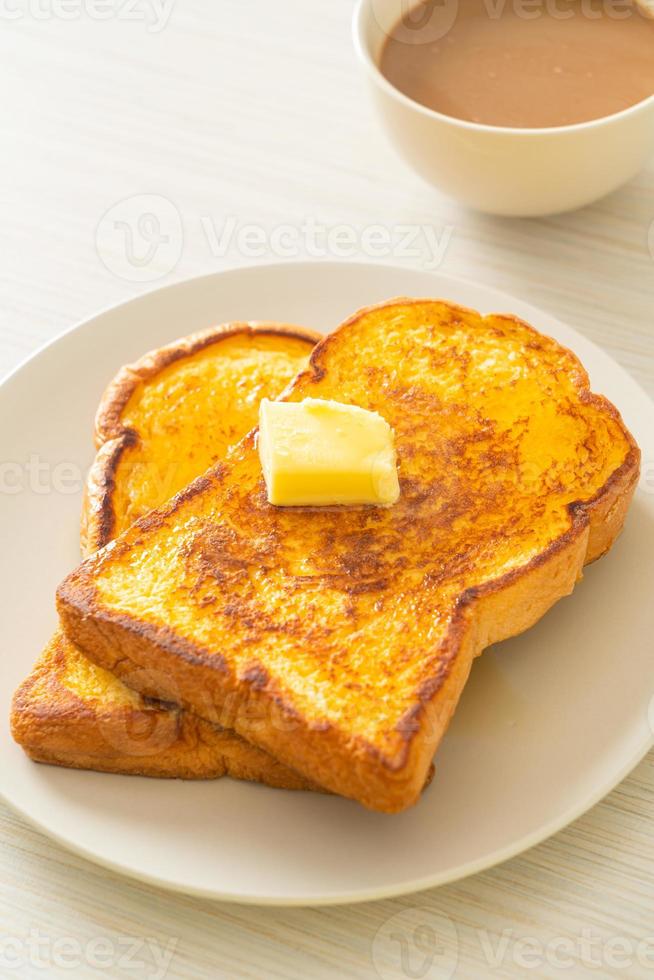 French toasted with butter and honey photo
