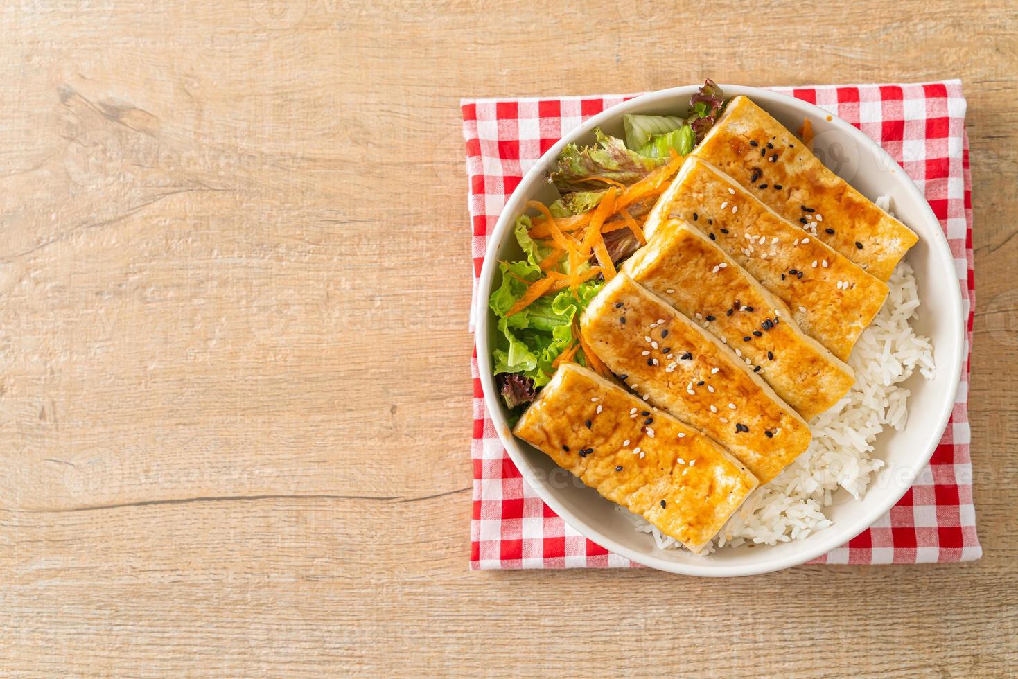 teriyaki tofu rice bowl - vegan food style photo