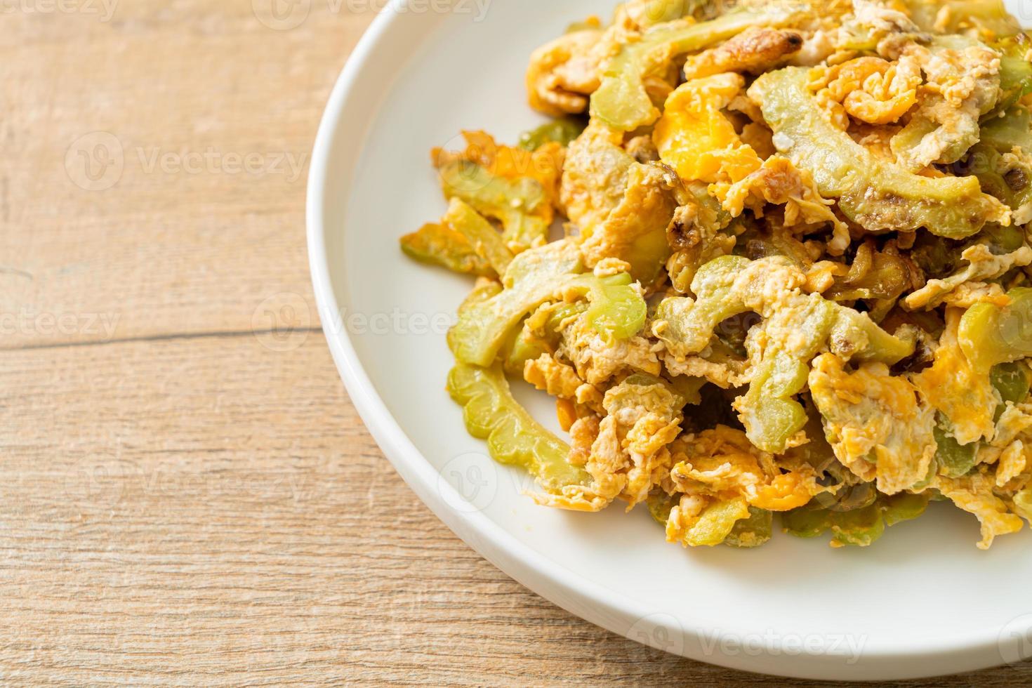Stir Fried Bitter Gourd with Egg 7669922 Stock Photo at Vecteezy