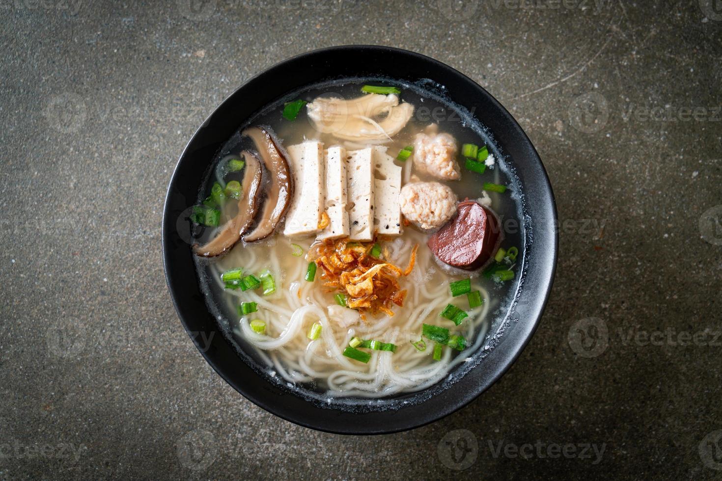 Vietnamese Rice Noodles Soup with Vietnamese Sausage served vegetables