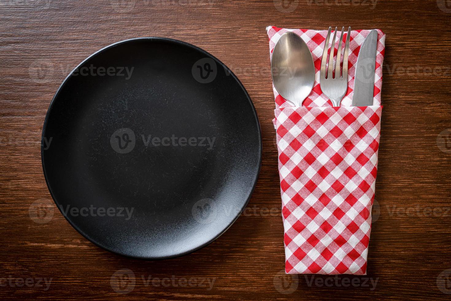 empty plate or dish with knife, fork and spoon photo