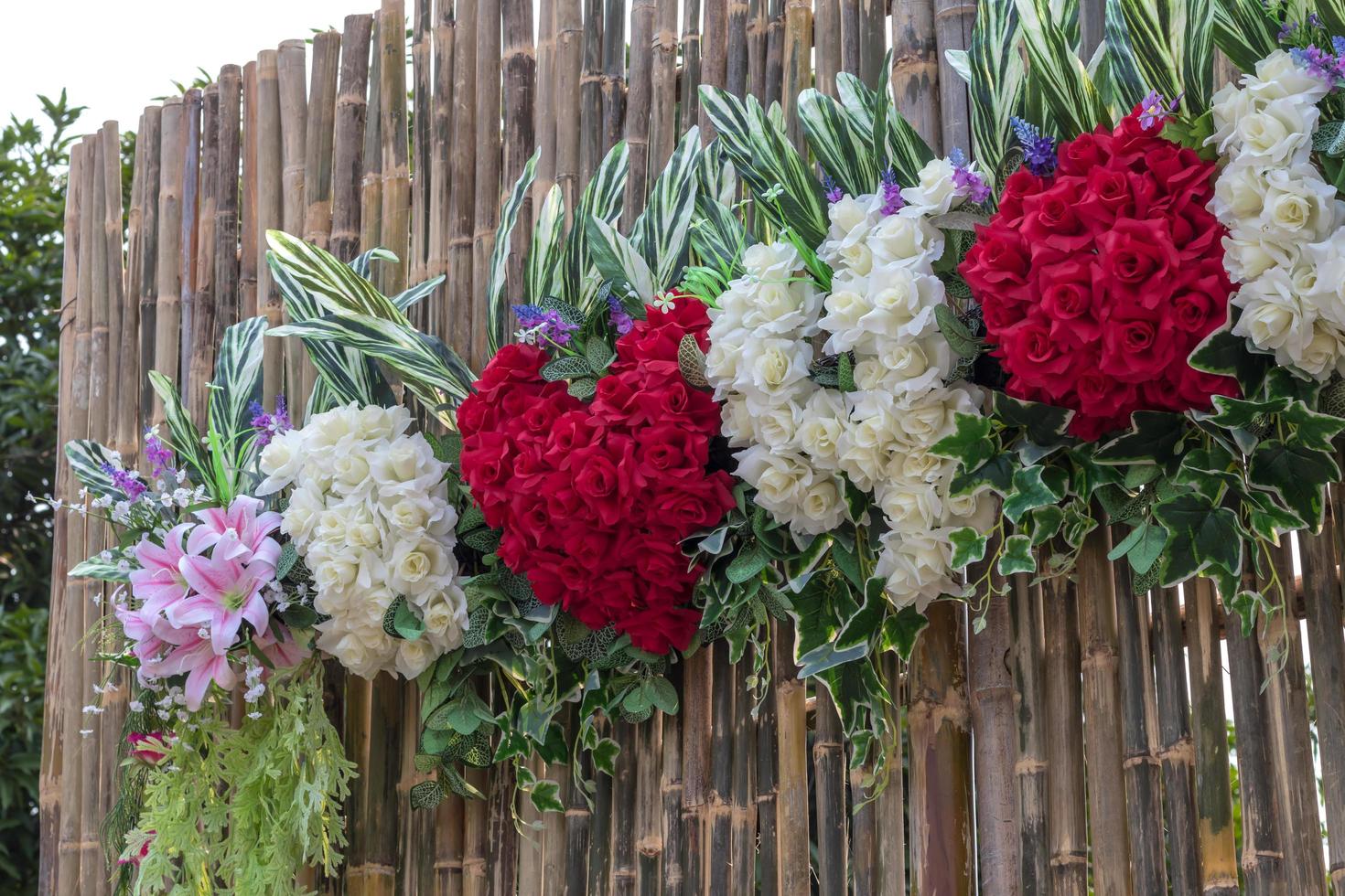 Artificial rose bouquet with bamboo. photo