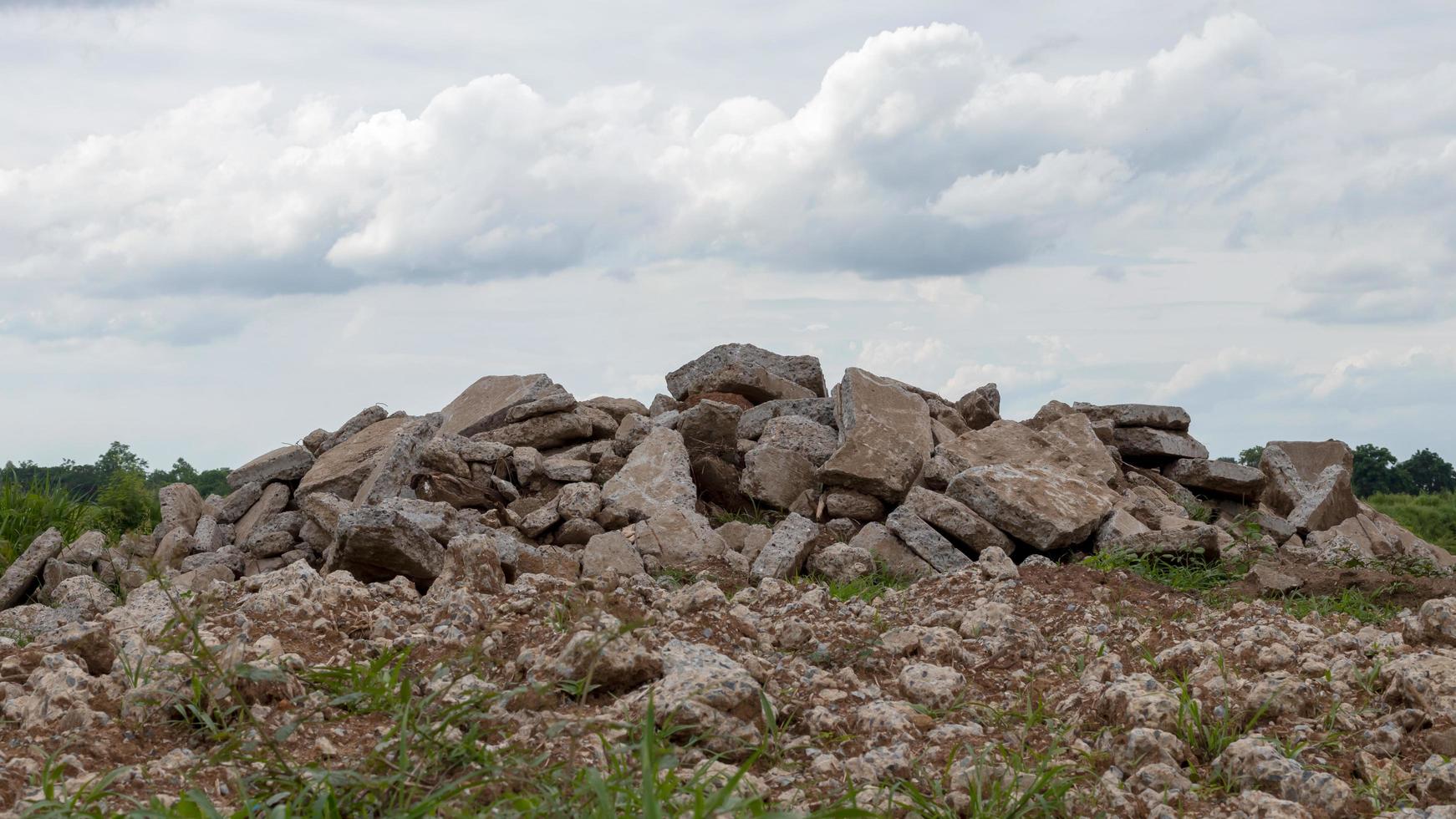 Concrete debris piles on rural land. photo