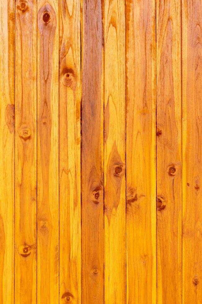 Vertical background pattern wall of the wooden door of the house. photo