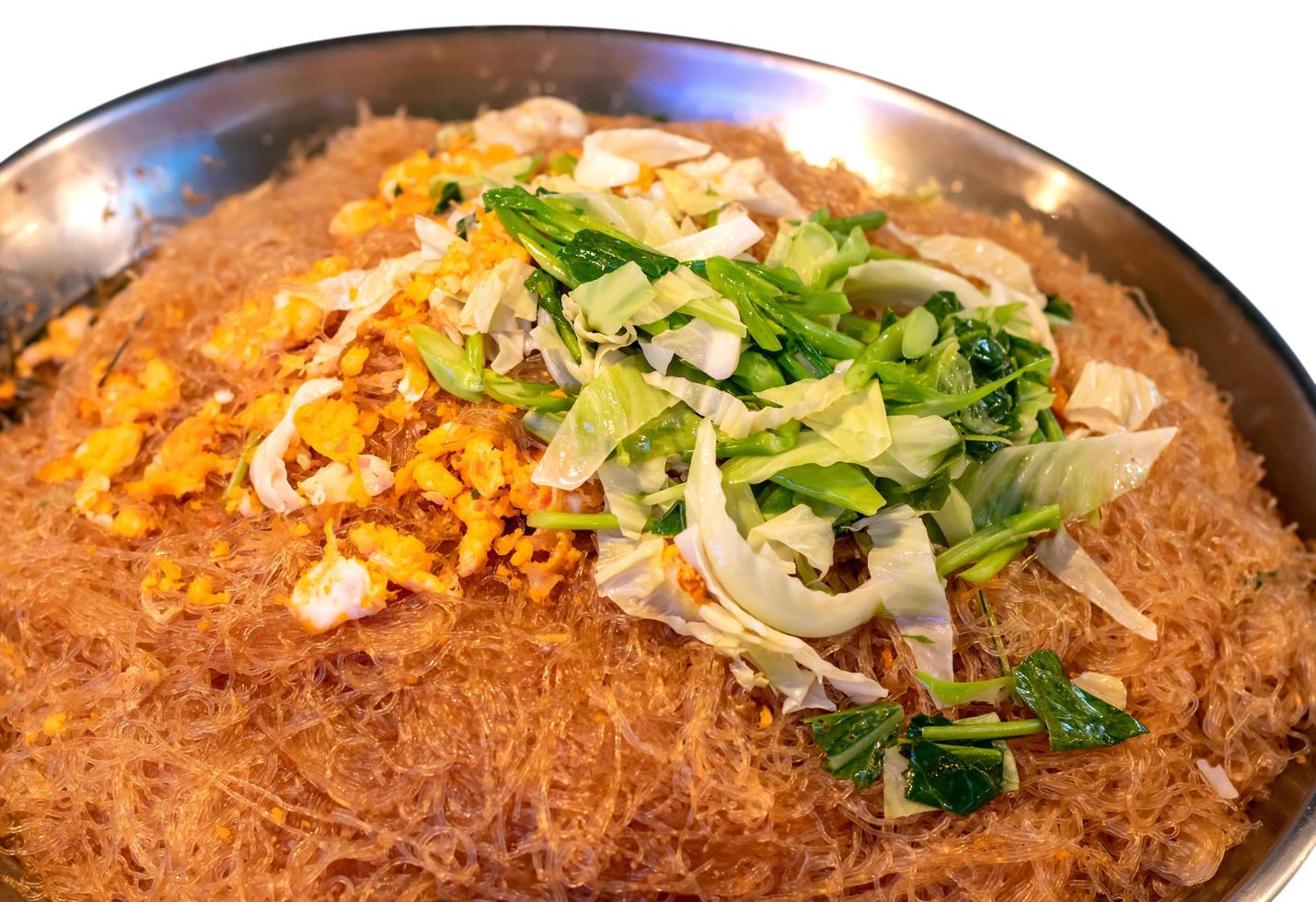 Fried noodles with many vermicelli and vegetables. photo