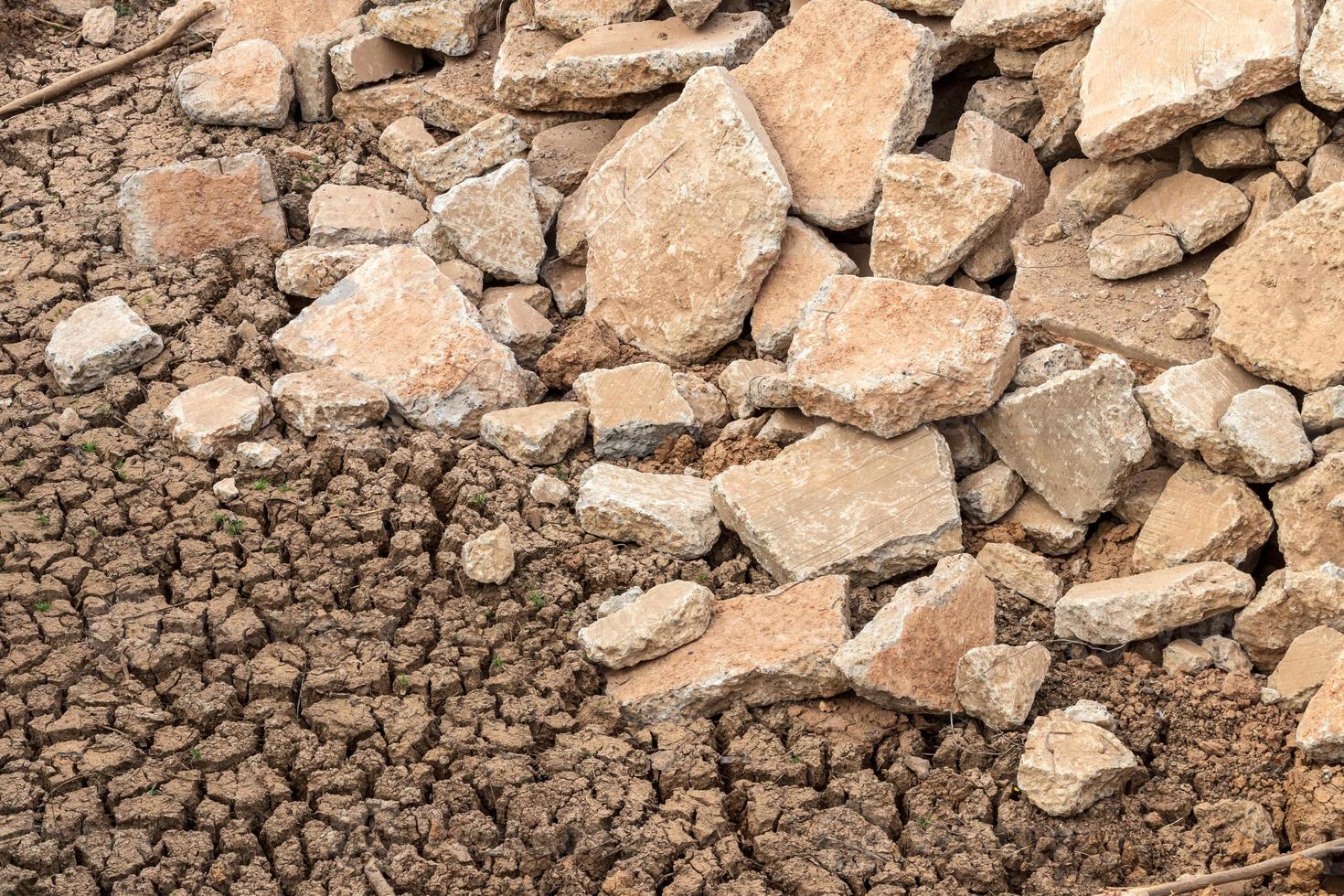 Concrete debris and mud cracked. photo