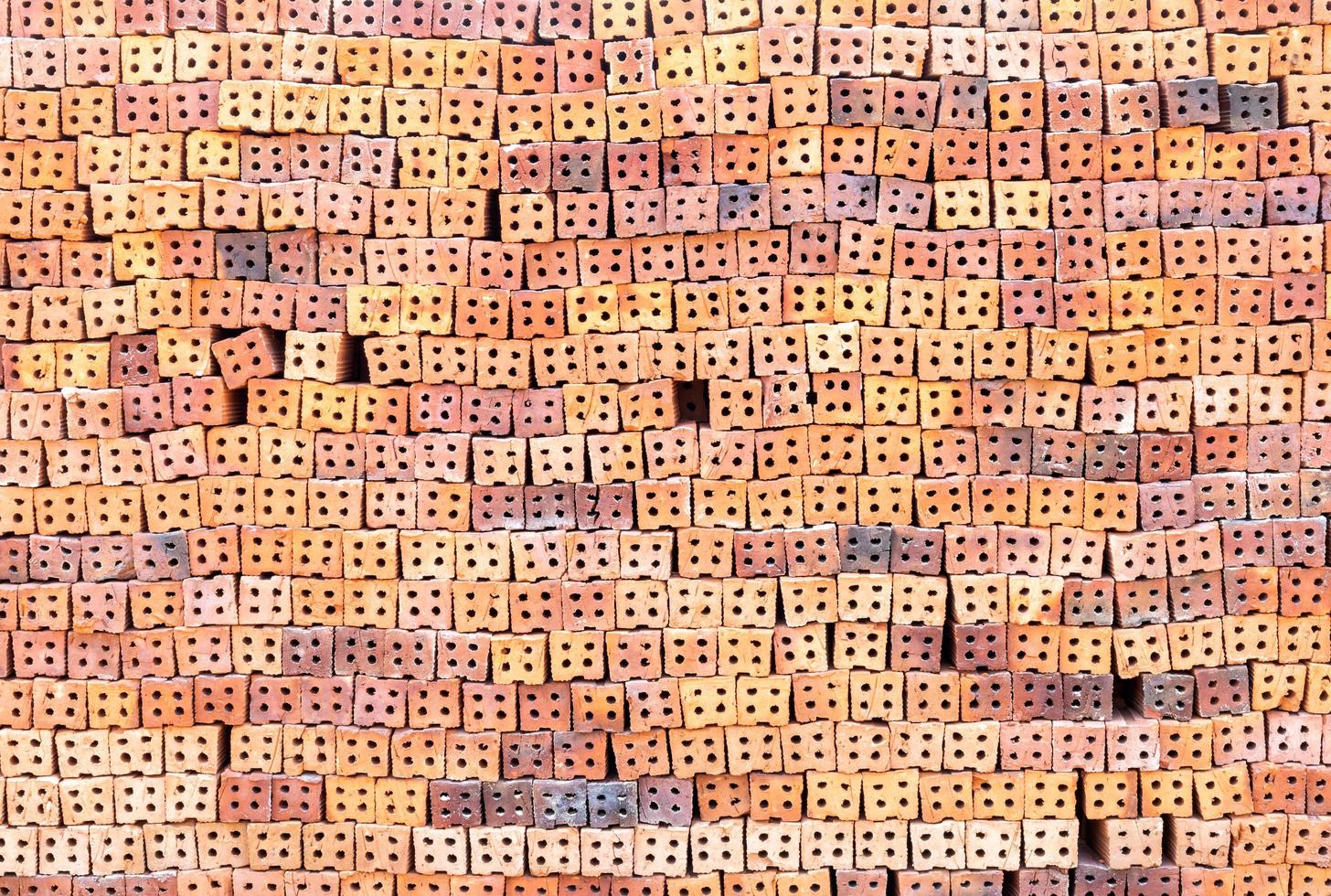 Many piles of bricks have holes. photo