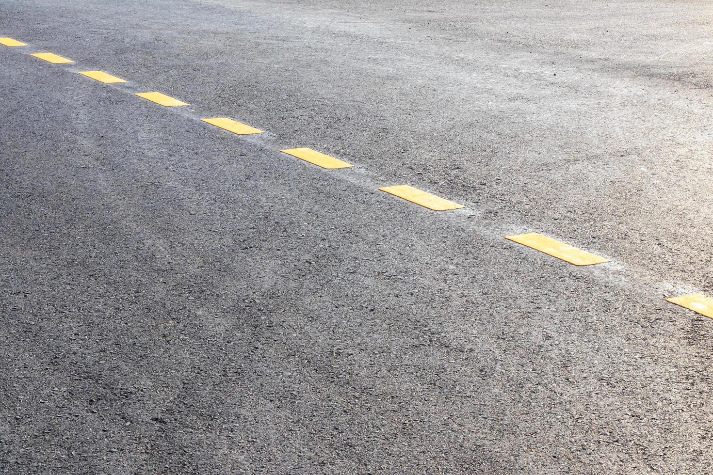 Paved surface with yellow dotted lines. 7674680 Stock Photo at Vecteezy