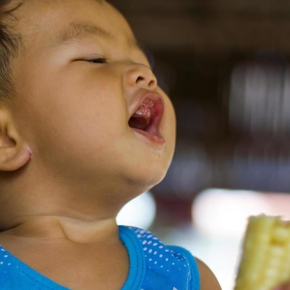 Children laughing, eating photo