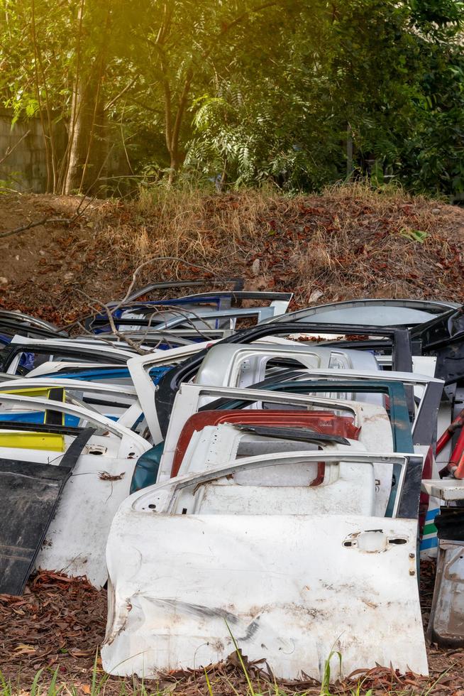 The car door parts are damaged on the ground. photo