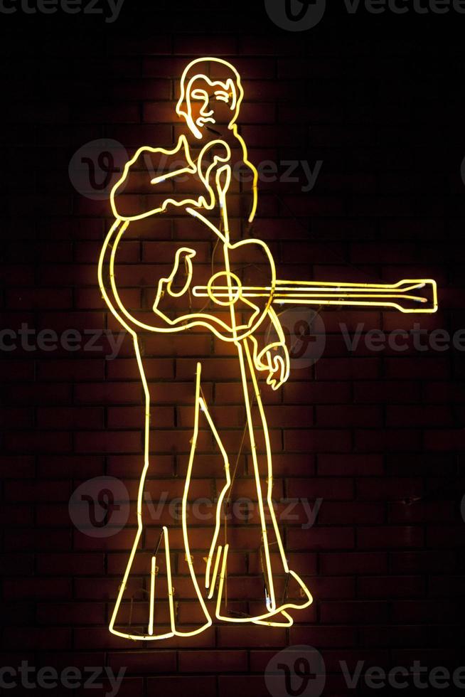 luz de neón en forma de elvis presley foto