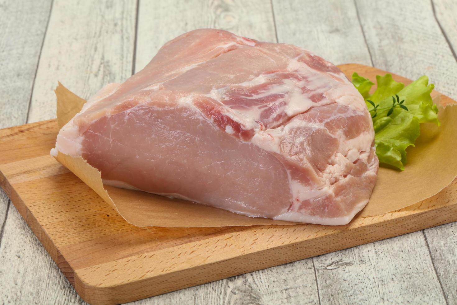 Raw pork meat piece for cooking photo