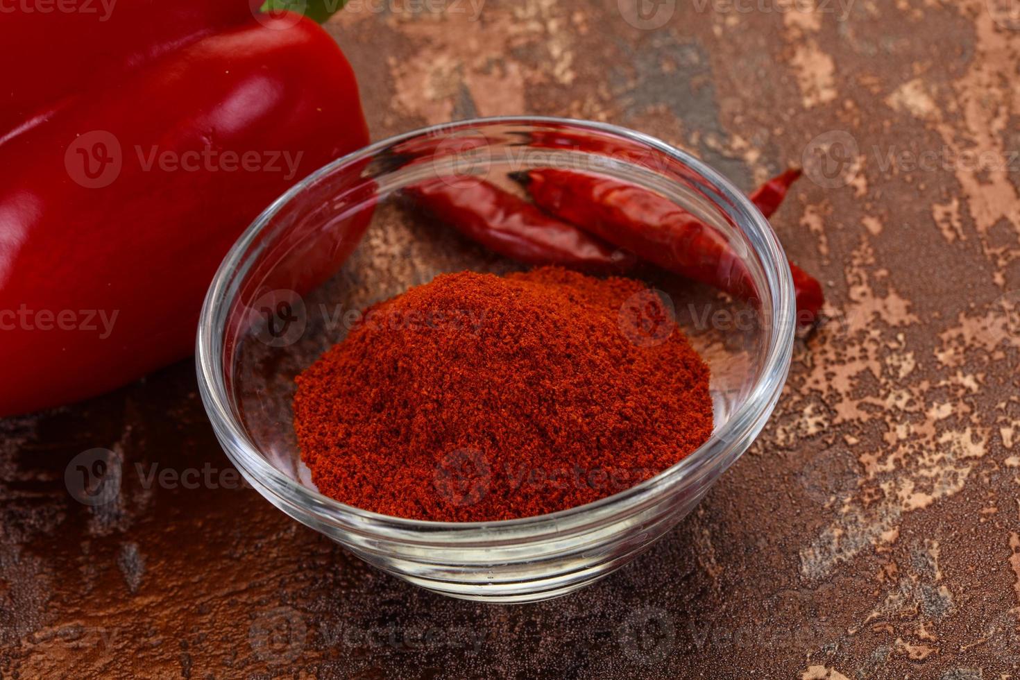 Paprika powder in the bowl photo