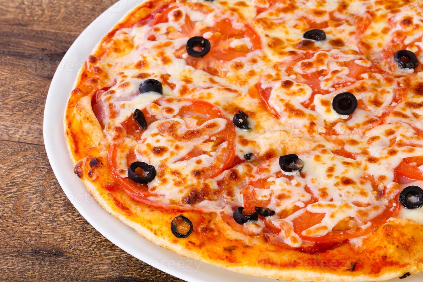 Margarita pizza with olives photo