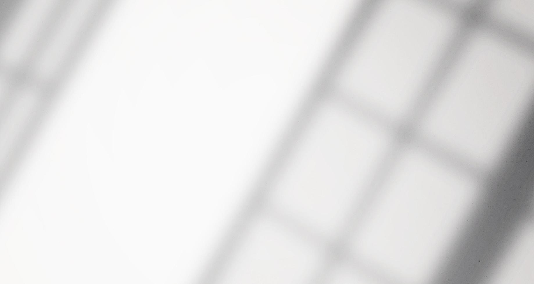 Realistic and minimalist blurred natural light windows, leaves shadow overlay on wall paper texture, abstract background, summer, spring, autumn for product presentation podium and mockup seasonal photo